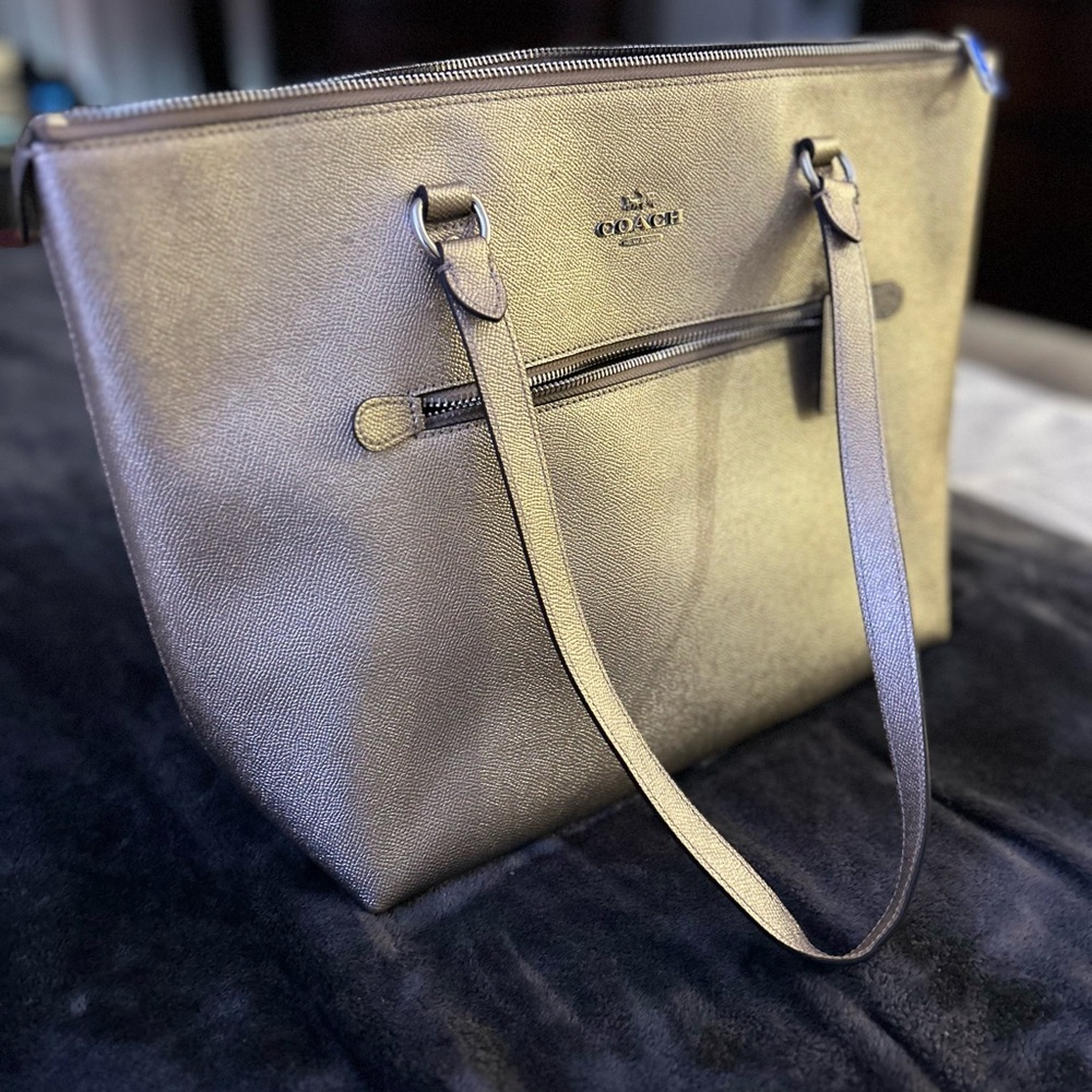 Coach Metallic gold shoulder bag.